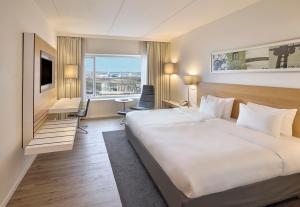 Postel nebo postele na pokoji v ubytování Crowne Plaza Copenhagen Towers by IHG + 37 fotografií