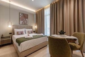 Postel nebo postele na pokoji v ubytování 1864 Apartments