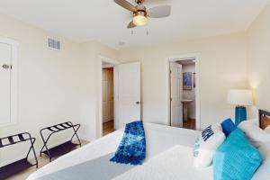 En eller flere senge i et værelse på The Beach Suite #3