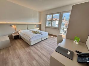 Rúm í herbergi á Albergo Garni Francesco