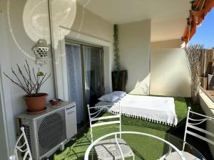 Posteľ alebo postele v izbe v ubytovaní Studio Front de Mer à 10mètres de la plage