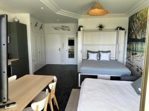 Posteľ alebo postele v izbe v ubytovaní Studio Front de Mer à 10mètres de la plage
