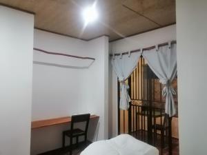 Curitagua Hotel Campestre客房内的一张或多张床位