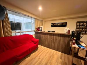 Sjónvarps- og/eða afþreyingartæki á HAYLLI QOSQO Hotel Inn