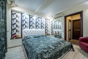 Postel nebo postele na pokoji v ubytování Alex Hotel on Budapeshtskaya