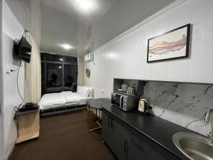 Giường trong phòng chung tại Chorvoq View +36 ảnh