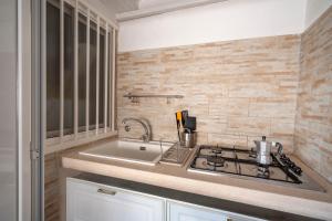 Kuchyň nebo kuchyňský kout v ubytování Casa Carolina Monopoli by il Pumo di Puglia + 70 fotografií