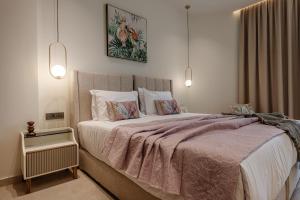 Postel nebo postele na pokoji v ubytování 1864 Apartments