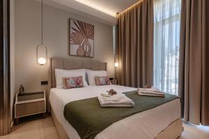 Postel nebo postele na pokoji v ubytování 1864 Apartments