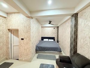 Postel nebo postele na pokoji v ubytování Hotel Faarmsi