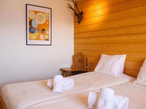 Postel nebo postele na pokoji v ubytování Chalet Ratatouille by Interhome
