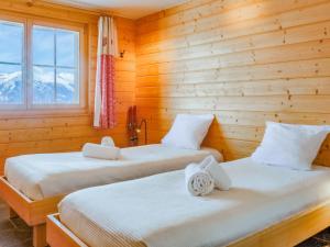 Postel nebo postele na pokoji v ubytování Chalet Ratatouille by Interhome