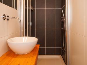 Koupelna v ubytování Chalet Ratatouille by Interhome