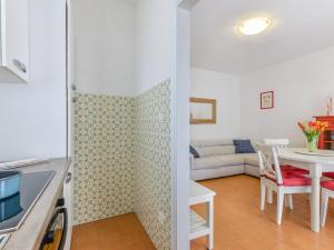A seating area at Apartment la Roccia by Interhome