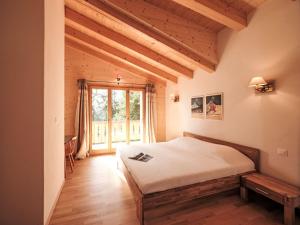 Postel nebo postele na pokoji v ubytování Chalet Dipankar by Interhome