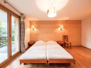 Postel nebo postele na pokoji v ubytování Chalet Dipankar by Interhome