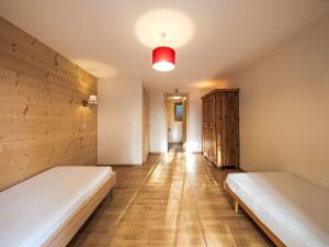 Postel nebo postele na pokoji v ubytování Chalet Dipankar by Interhome