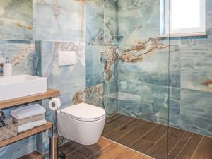 Koupelna v ubytování Holiday Home Villa Temelia by Interhome