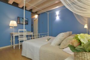 Postel nebo postele na pokoji v ubytování Casa dei Racconti