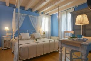 Postel nebo postele na pokoji v ubytování Casa dei Racconti