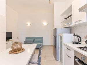 Kuchyň nebo kuchyňský kout v ubytování Apartment Al numero 13 by Interhome