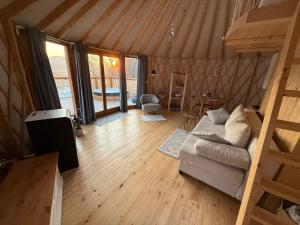 an overhead view of a living room in a yurt at azyl glamp in Uście Gorlickie