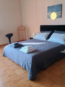 Postel nebo postele na pokoji v ubytování La Divina guest house