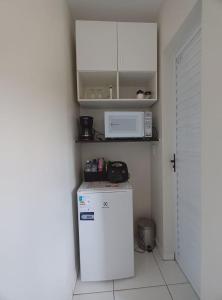 Kuchyň nebo kuchyňský kout v ubytování chalés da Ana pertinho do rio preguiça + 2 fotografie