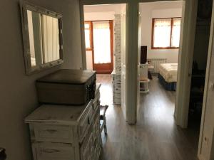 a room with a room with a bed and a room with boxes at Apartamento Triana Rio in Arenas de San Pedro