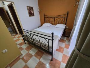Postel nebo postele na pokoji v ubytování Boutique Hotel Colosseo