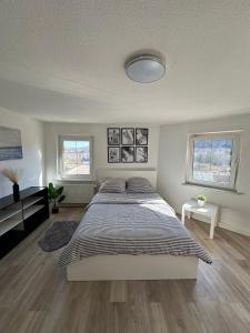 Postel nebo postele na pokoji v ubytování Rooms in Dresden + 9 fotografií