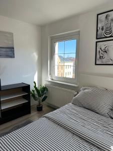Postel nebo postele na pokoji v ubytování Rooms in Dresden