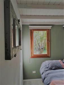 Voodi või voodid majutusasutuse Casita de huespedes toas