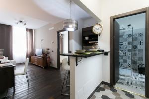 Kuchyň nebo kuchyňský kout v ubytování Aparthotel Dei Mercanti + 37 fotografií
