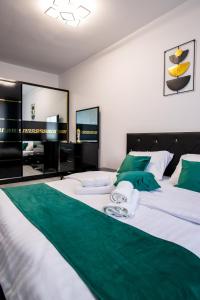 Postel nebo postele na pokoji v ubytování Joy Residence