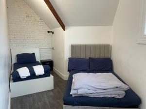 Letto o letti in una camera di Rahman Hostel