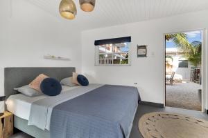 Postel nebo postele na pokoji v ubytování The Hut Bonaire
