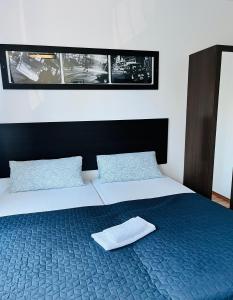 Letto o letti in una camera di Art HOTEL
