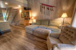 a living room with a couch and a table at Cheyenne's Place home in Kings Beach