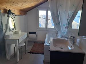 a bathroom with a sink and a vanity with a mirror at Ristorante Bellavista in Santa Maria +35 photos