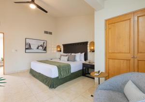 Postel nebo postele na pokoji v ubytování Hotel Tesoro Los Cabos
