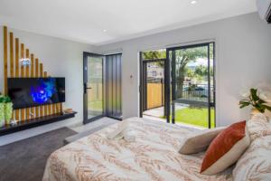 Ένα ή περισσότερα κρεβάτια σε δωμάτιο στο Lower Hutt Hideaway