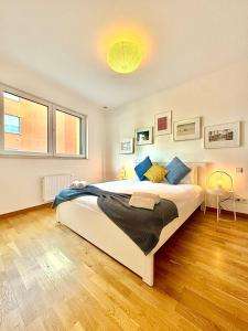 Ένα ή περισσότερα κρεβάτια σε δωμάτιο στο Cosy 2 bedrooms apartment +66 φωτογραφίες
