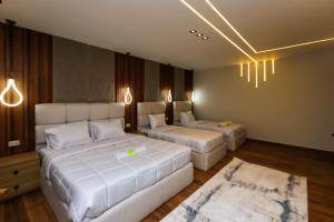 Voodi või voodid majutusasutuse Pyramids moon Tower toas