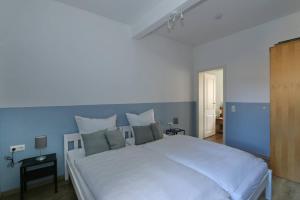 Postel nebo postele na pokoji v ubytování Ferienhaus Waldecker Auszeit