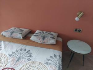 Letto o letti in una camera di Mon Ti Kaz Canot