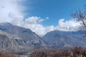 a view of a mountain range with snow covered mountains at Zia Guest House in Gilgit +2 photos