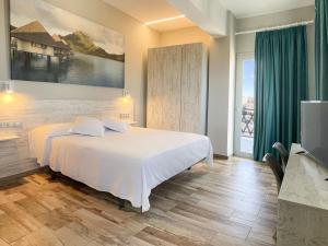 Postel nebo postele na pokoji v ubytování Te Maná Hotel