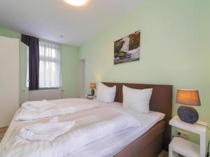 Postel nebo postele na pokoji v ubytování Ferienwohnung Remise, Wernigerode