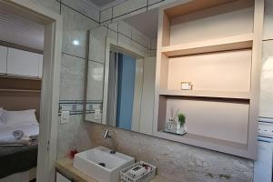 Ένα μπάνιο στο Casa Confortável com Fogão a Lenha e Churrasqueira +12 φωτογραφίες